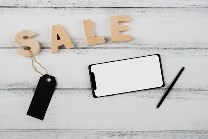 top-view-view-phone-cubes-wooden-background