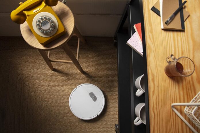 close-upon-robot-vacuum-cleaner-indoors