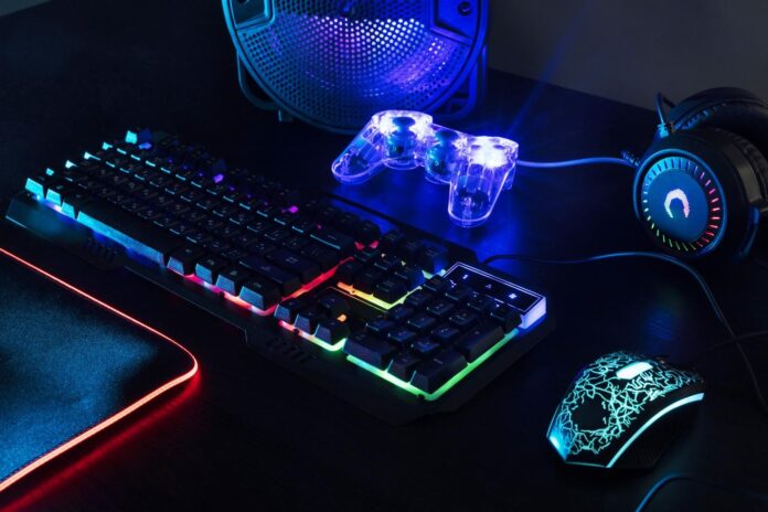 view-illuminated-neon-gaming-keyboard-setup-controller
